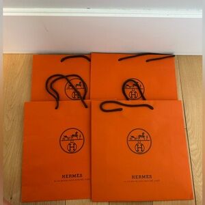 Lot of 4 Hermes orange shopping bag 12”x12”